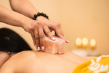 Rejuvenating massage with petals and salt