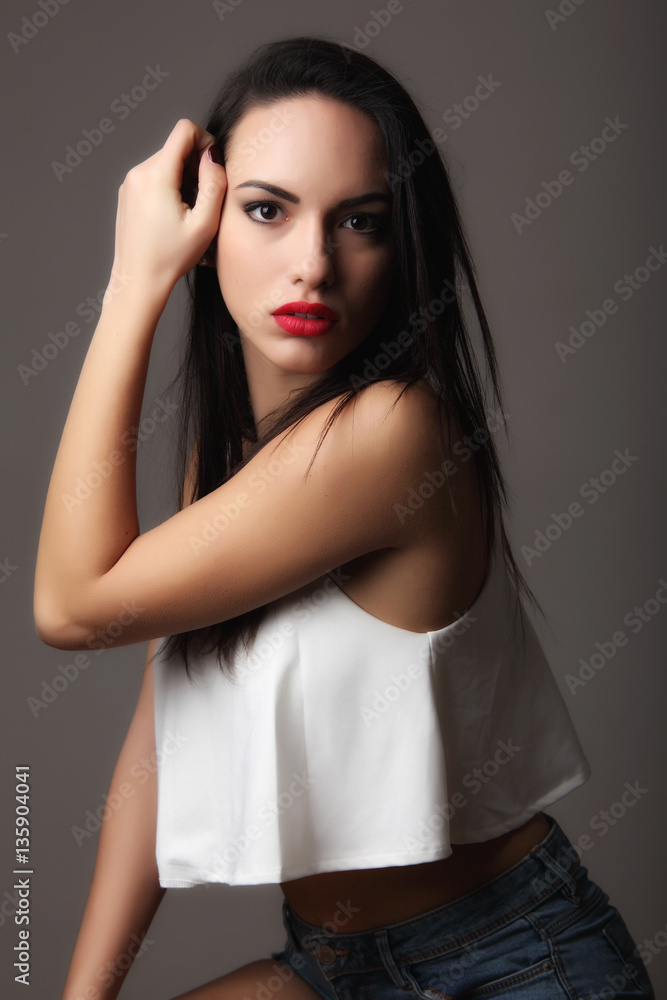 Naklejka premium Fashion portrait of beautiful young woman