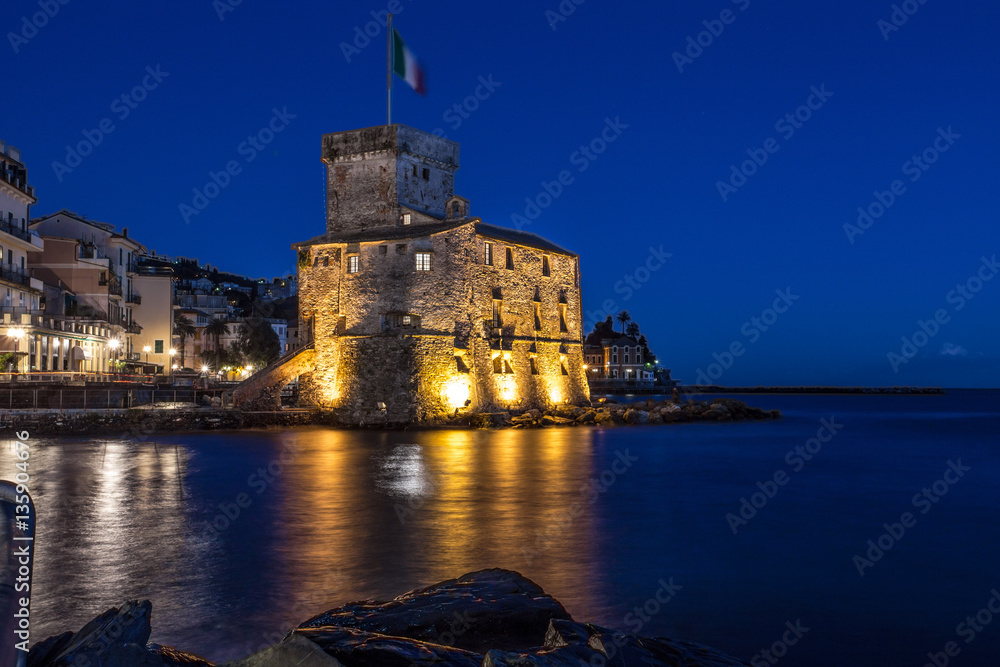 The ancient castle on the sea by night, Rapallo, Genoa (Genova), Italy