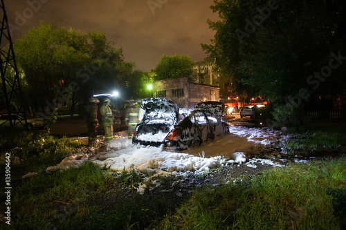 Firefighters extinguished the car at night