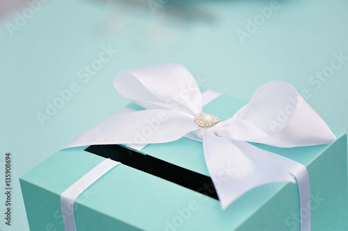 Wedding mail box with bow, closeup photo