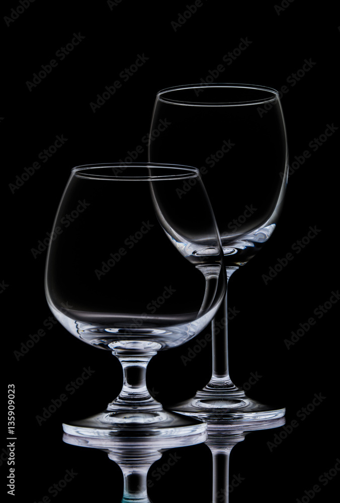 Crystal wine glasses, closeuo shot on black isolated.