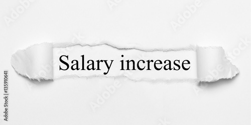 Salary increase auf weißen gerissenen Papier