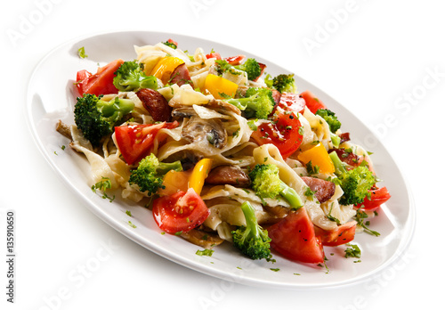 Pasta with meat, tomato sauce and vegetables 