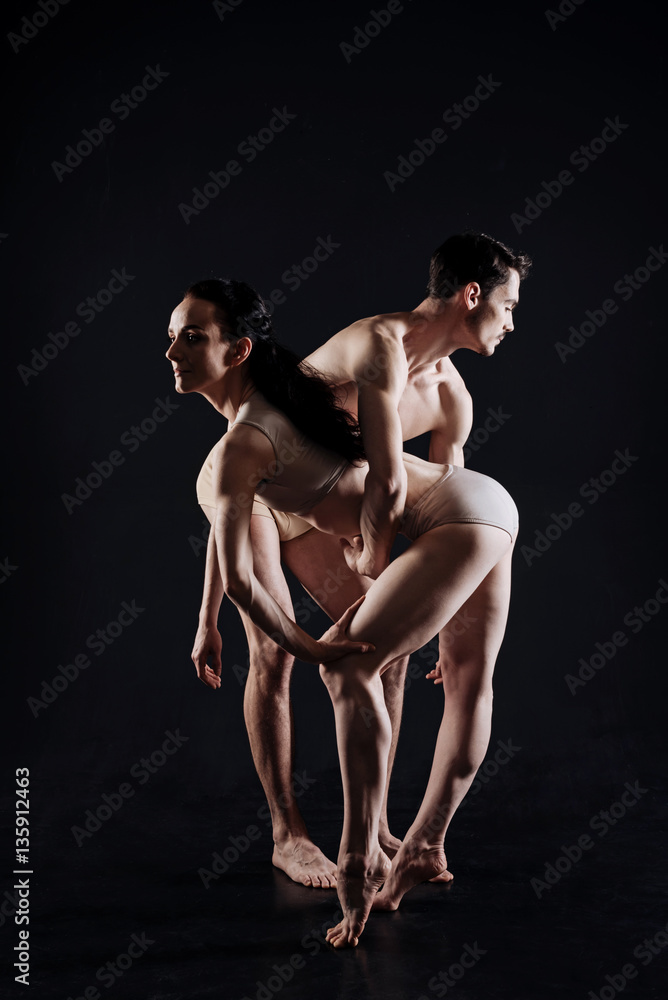 Naklejka premium Masterful athletes demonstrating their skills in the studio