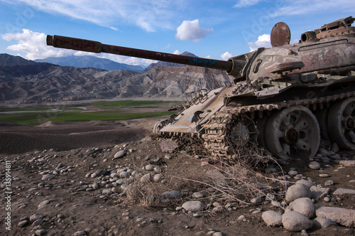 An abandoned Russian tank on the road to Jalalabad from Kabul, Afghanistan photo