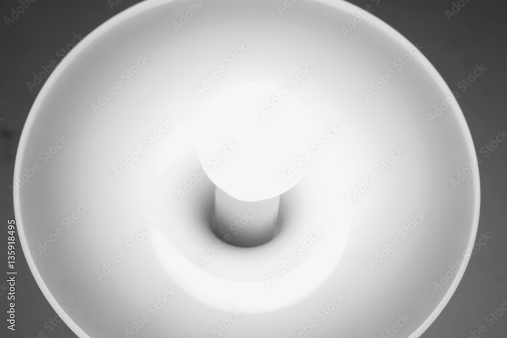 light bulb shines a bright light, soft focus light bulb shines a bright light, soft focus