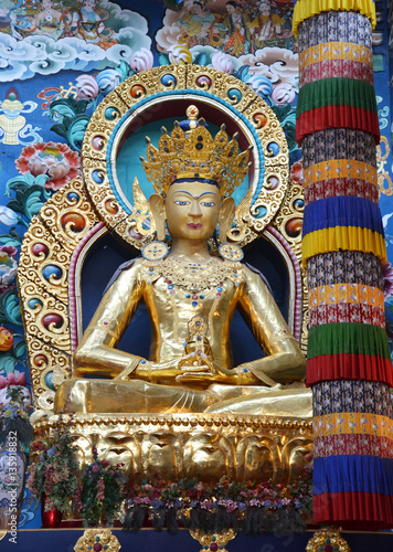 Buddha statues in a Tibetan monastery photo