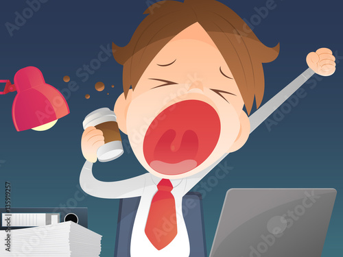 Businessman working overtime late night in office