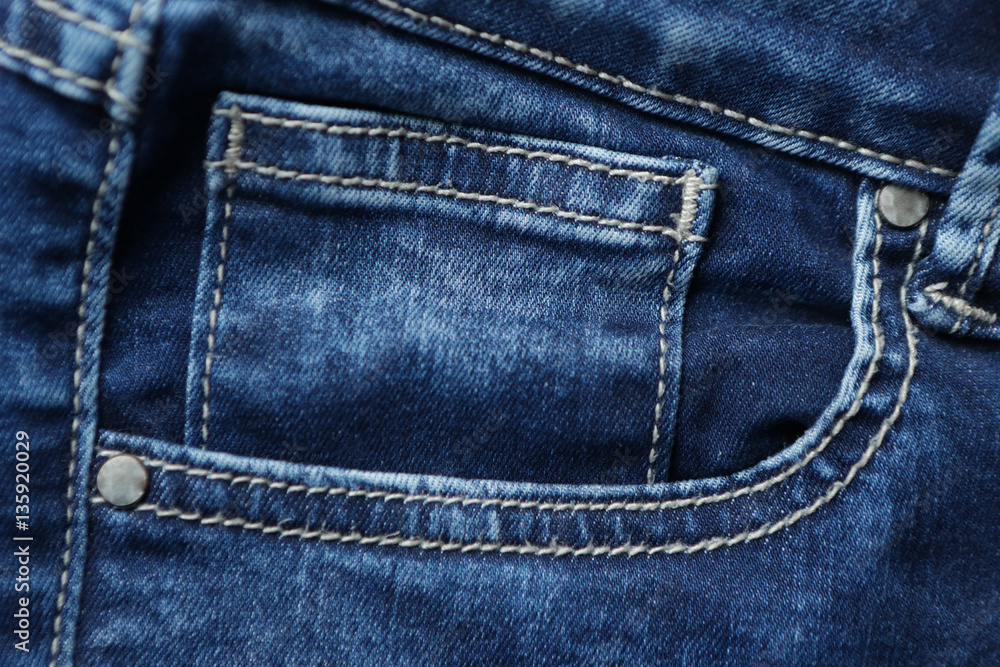 Blue denim jeans texture and background with seams Blue denim jeans texture and background with seams