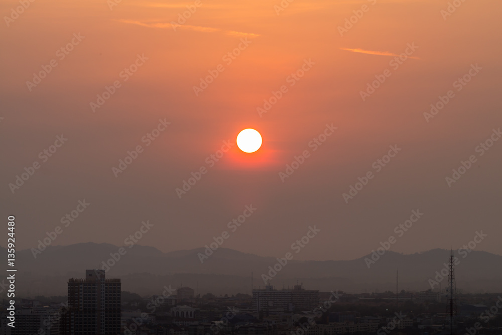 Sunrise over the city is developing.