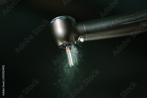 dental diamond cylinder bur with hand-piece and water spray