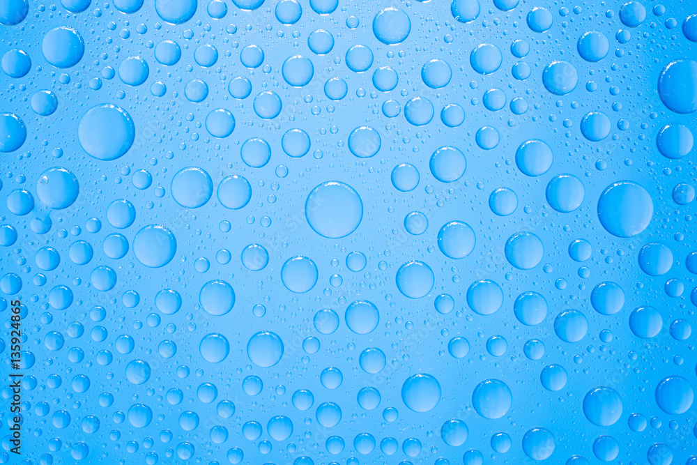 Water drops on blue background