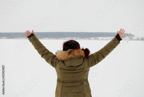 a woman on a winter lake
