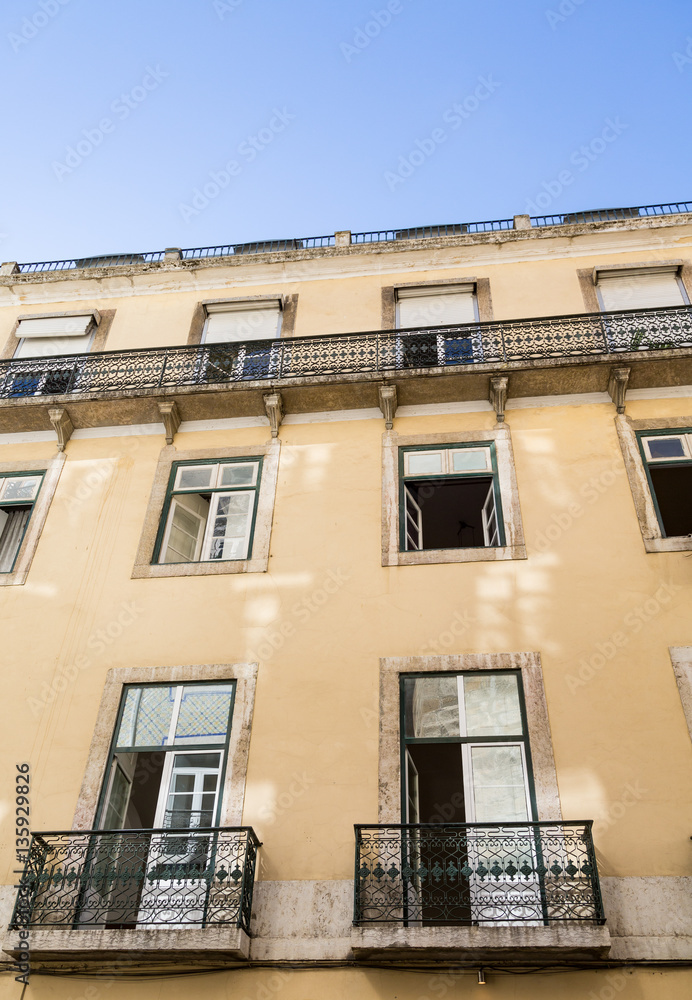 Two French Balconies on Plaster Apartment