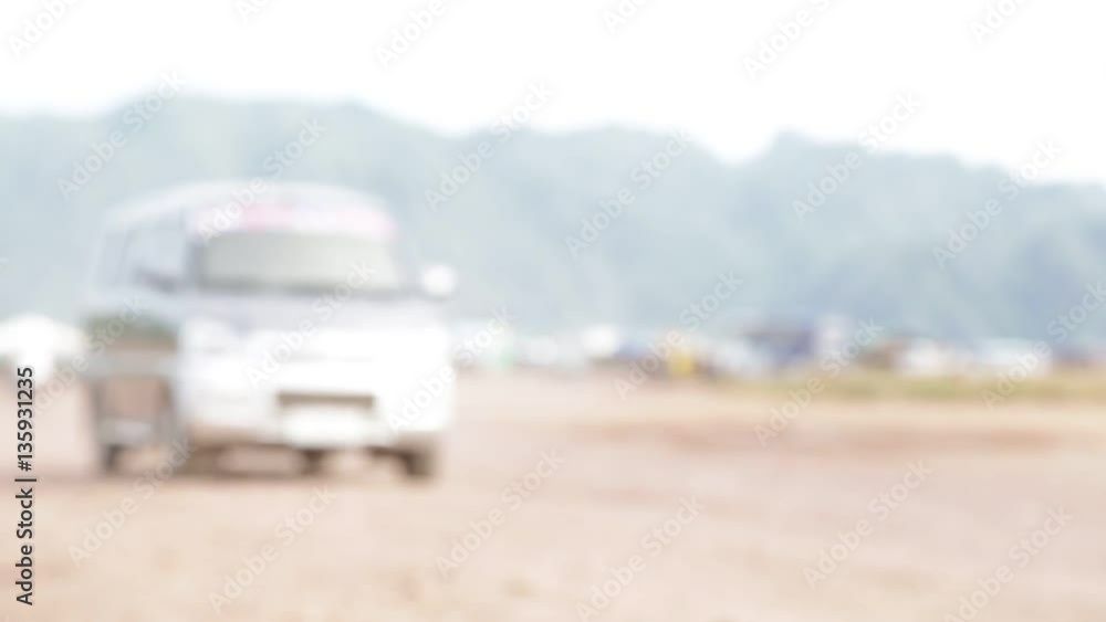 near sea blur in philippines people walking and riding motorbike traffic jam center town . near sea blur in philippines people walking and riding motorbike traffic jam center town .
