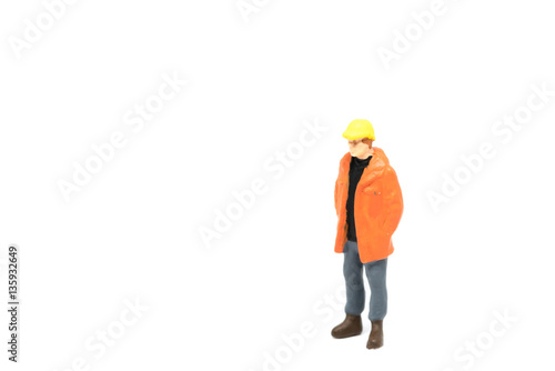 Miniature people engineer worker construction on white background