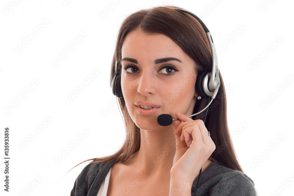 close up portrait of young beauty call office girl with headphones isolated on white background in studio close up portrait of young beauty call office girl with headphones isolated on white background in studio