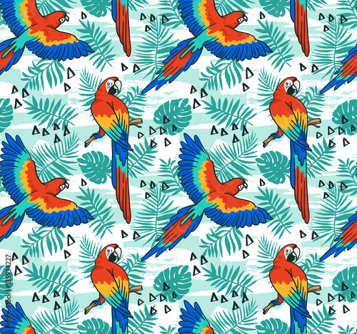 Ara parrot vector seamless pattern. Tropical fabric design with leaves and birds.