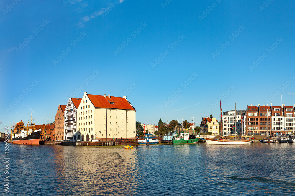 View across the Motlawa River to the Granary Island in Gdansk, Poland.