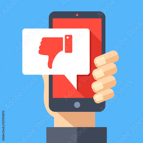 Hand holding smartphone with dislike message, dislike button. Thumbs down icon. Social networking, social media usage on mobile device. Modern concepts. Flat design vector illustration