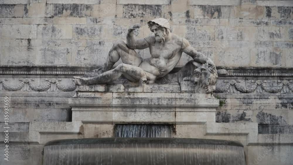 Fountain with marble statue of the National Monument to Victor Emmanuel II also known as Altare Della Patria in Rome, Italy Fountain with marble statue of the National Monument to Victor Emmanuel II also known as Altare Della Patria in Rome, Italy