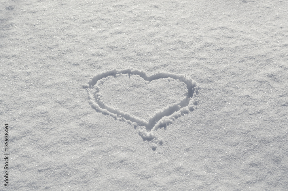 Romantic Valentines heart drawn on the snow love Romantic Valentines heart drawn on the snow love