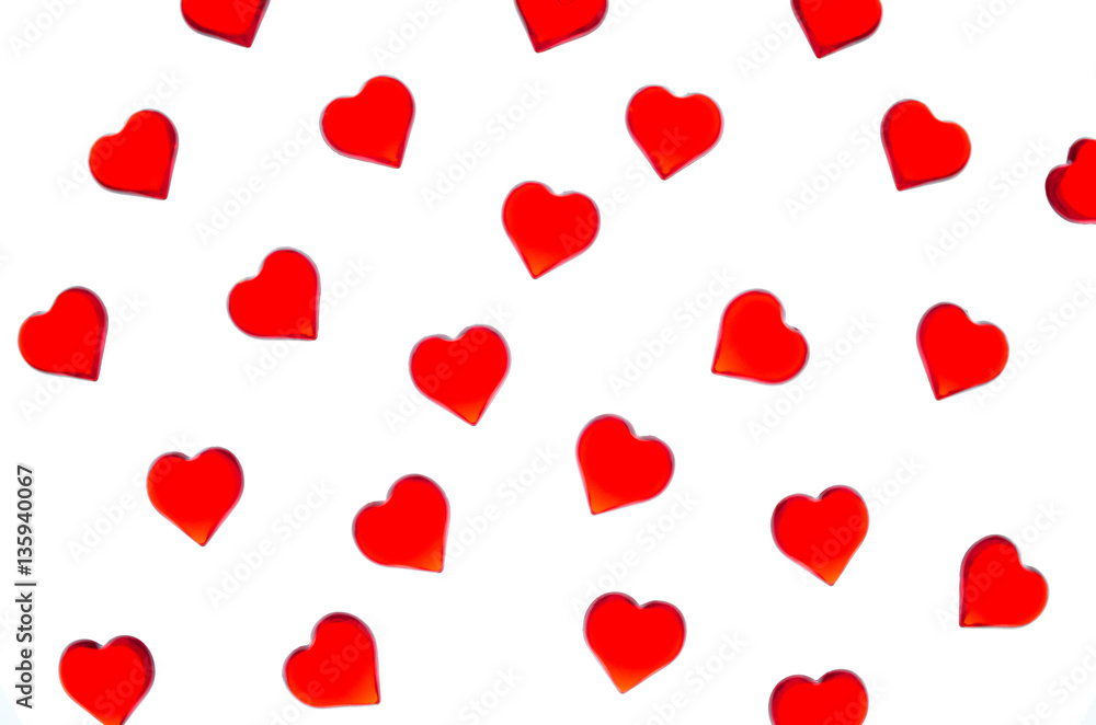 Bright red hearts on a striped background. In order to use Valentine's Day, weddings, International Women's Day Bright red hearts on a striped background. In order to use Valentine's Day, weddings, International Women's Day