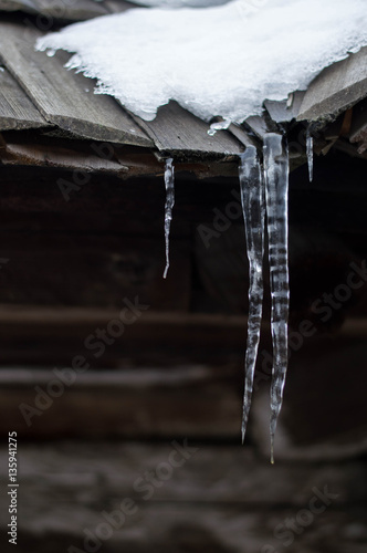 Icicles on an old house