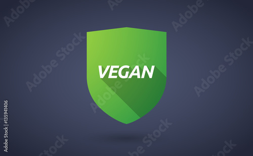 Long shadow shield with    the text VEGAN