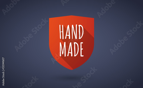 Long shadow shield with    the text HAND MADE