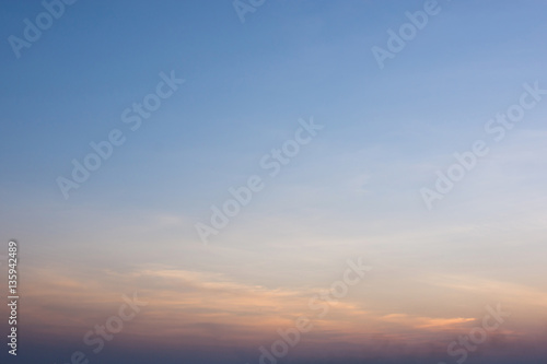 The sky in orange and blue shades, nature background.