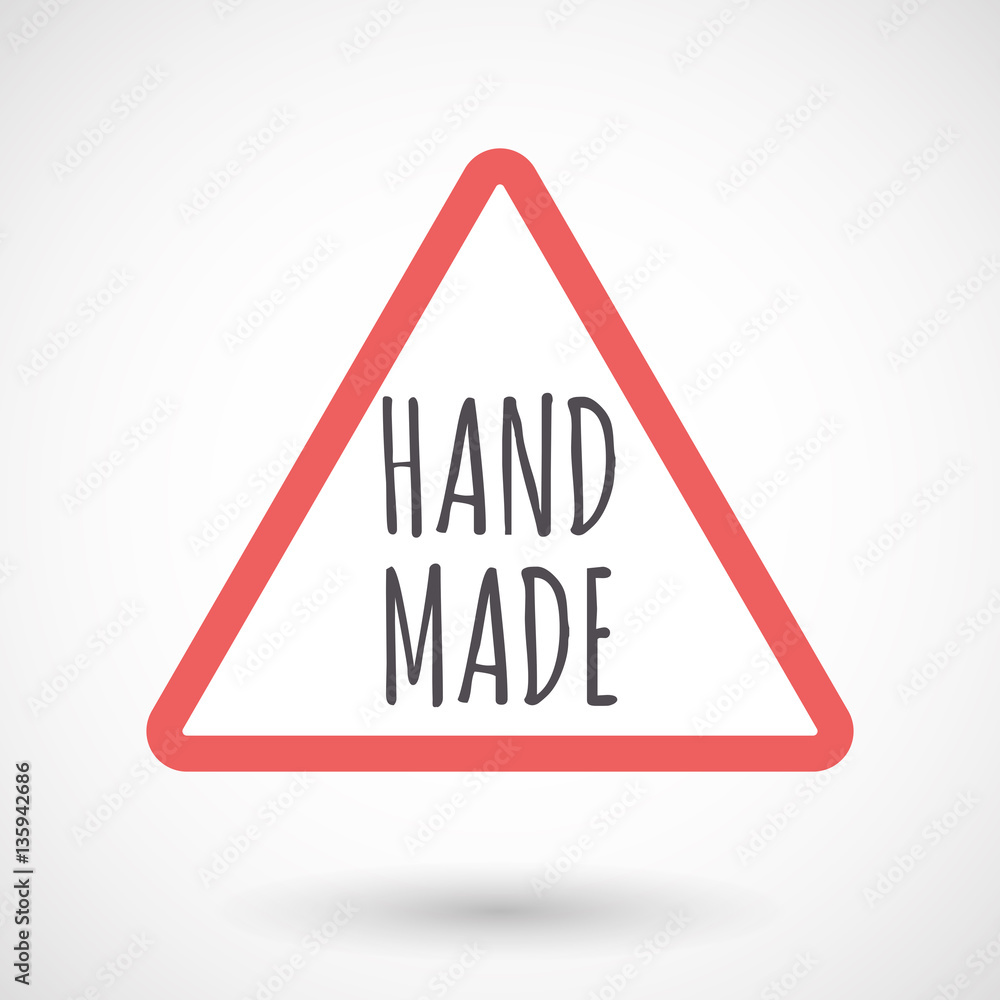 Isolated warning signal with the text HAND MADE Isolated warning signal with the text HAND MADE