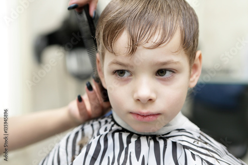 Child having a haircut
