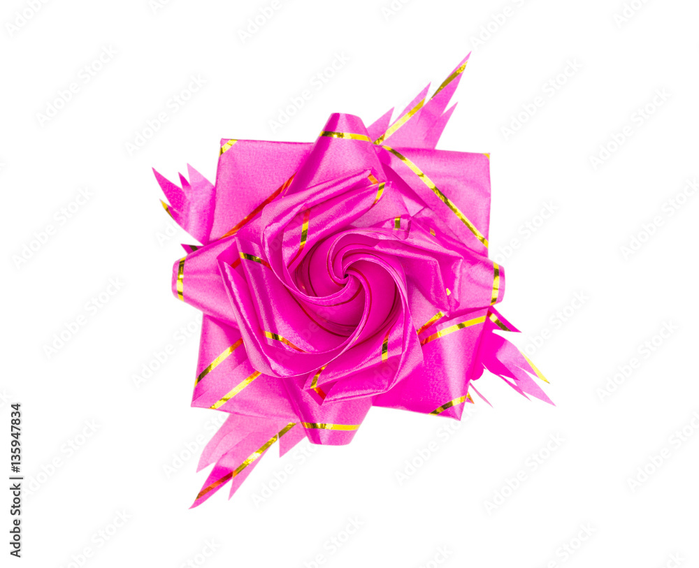 Pink Christmas bow ribbon isolated on the white background with clipping path