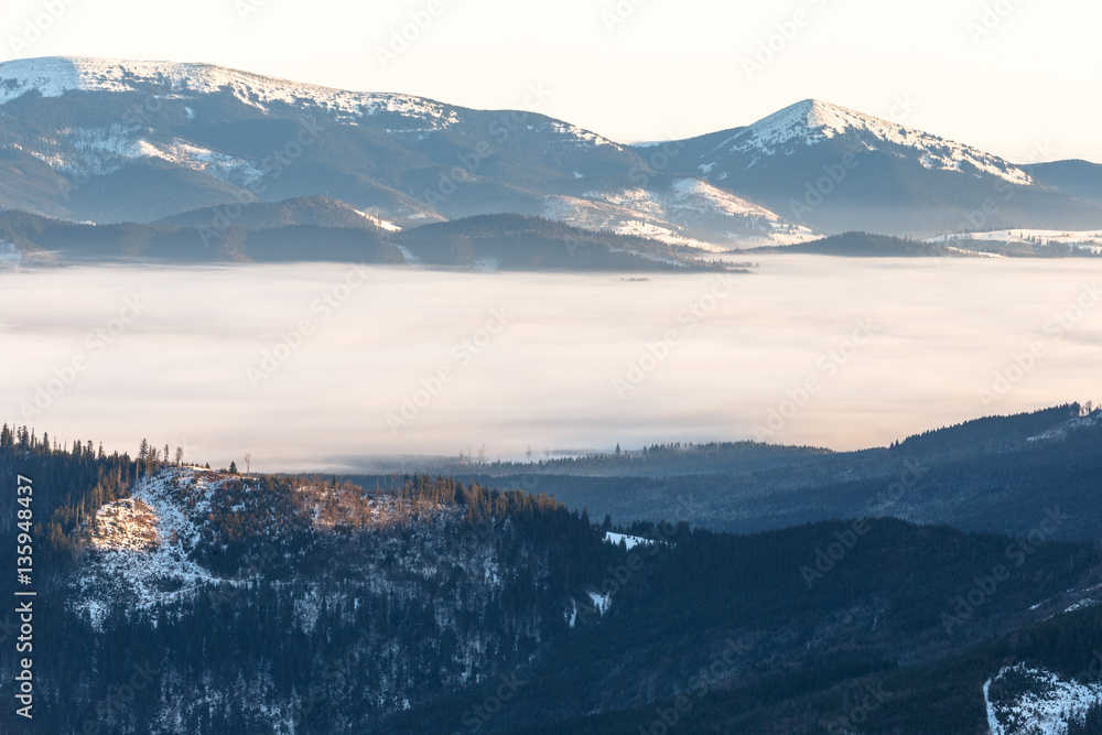 misty mountains on ski resort