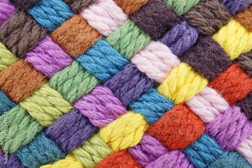 Canvas Print Colorful yarn weave close up
