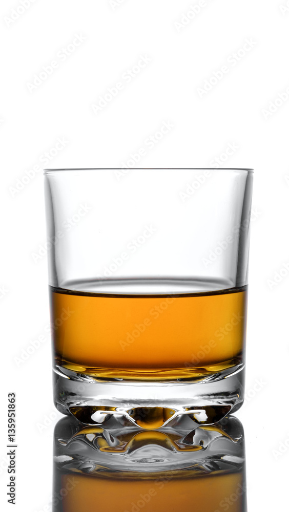 Glass of whiskey on a white background Glass of whiskey on a white background