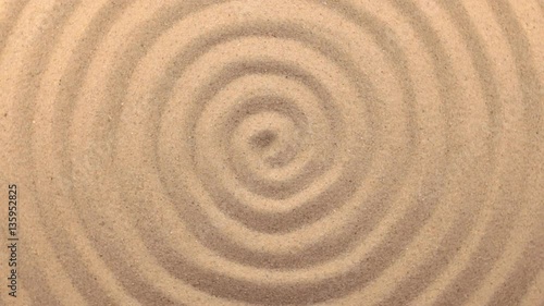 Beautiful lighting effects. Rotation sand in the form of a spiral.
