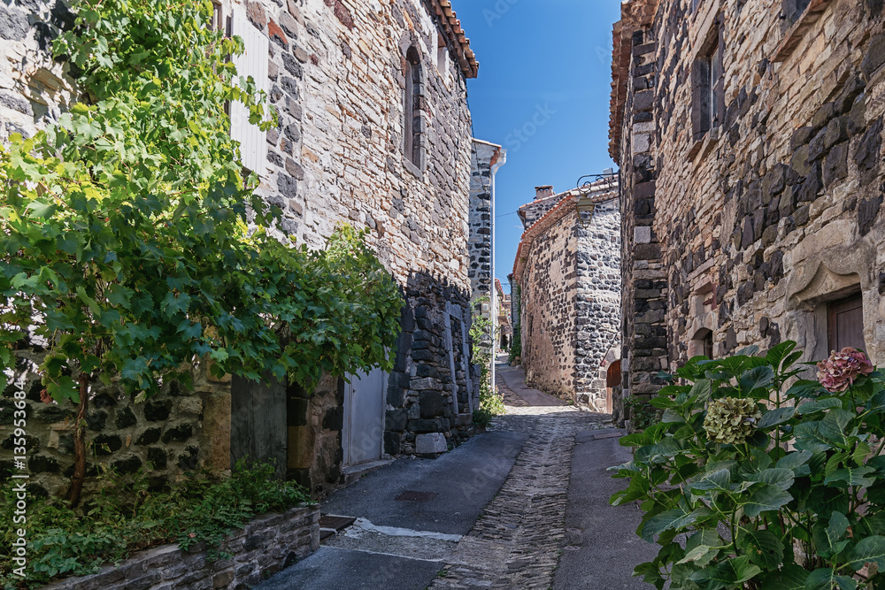 The narrow street  in the picturesque village of Mirabel.in the Ardeche department in France.