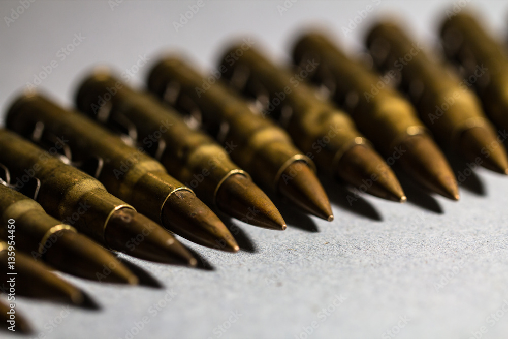 Bullet line up as criminal, politics, violence, conflict, danger Bullet line up as criminal, politics, violence, conflict, danger