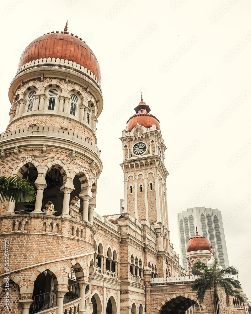 Bangunan Sultan Abdul Samad located along Jalan Raja in front of the Dataran Merdeka or Independence Square. Photography is colored in warm muted colors.