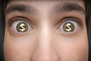 Gambling concept. Young man has dollar signs in his eyes.