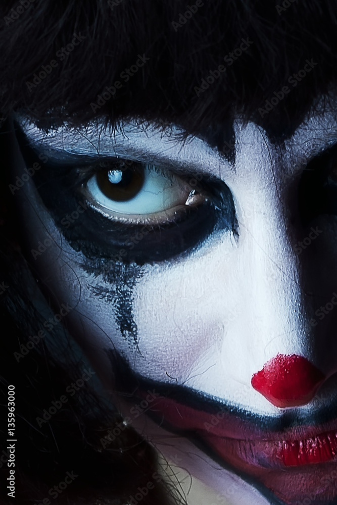 sad clown mask on woman face Stock Photo | Adobe Stock