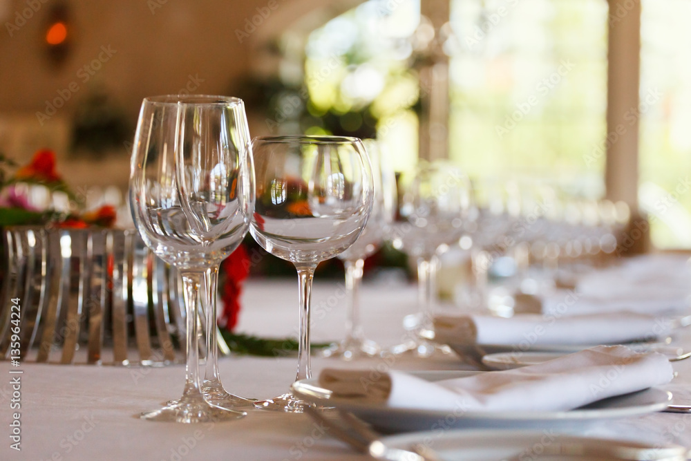 Serving table prepared for event party or wedding. Soft focus, selective focus Serving table prepared for event party or wedding. Soft focus, selective focus