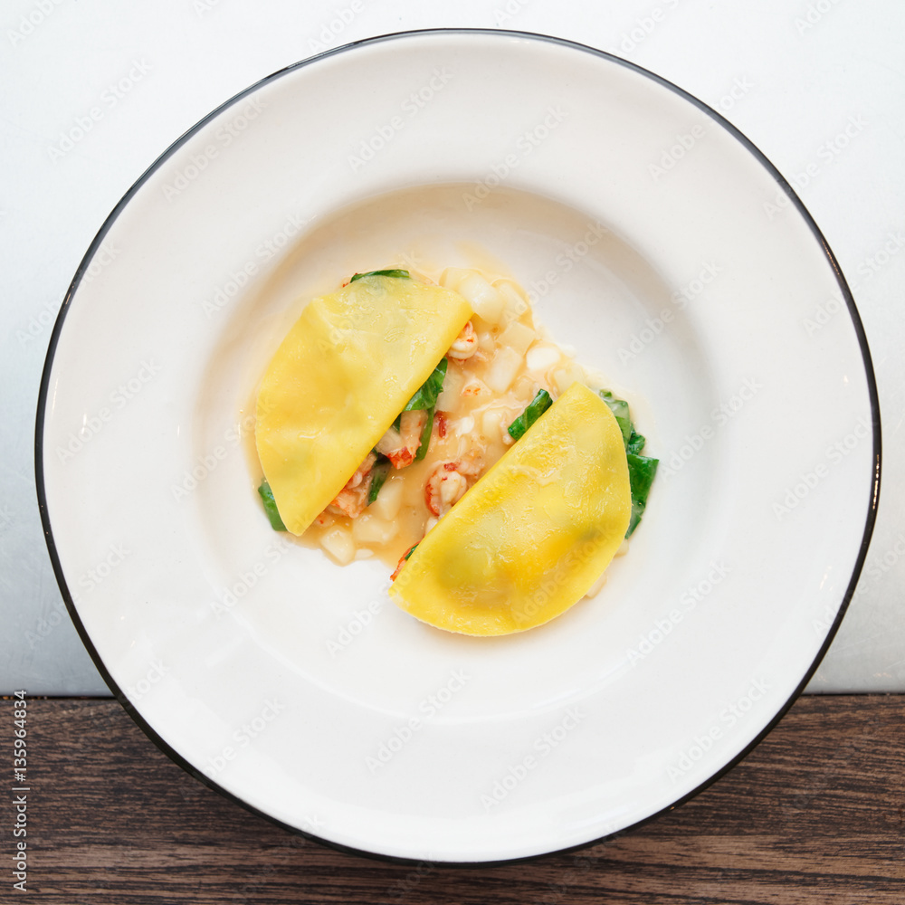 Ravioli-like dish with crayfish, apples and herbs Ravioli-like dish with crayfish, apples and herbs