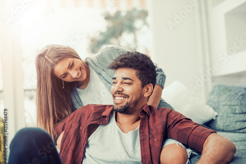 Happy young couple at home