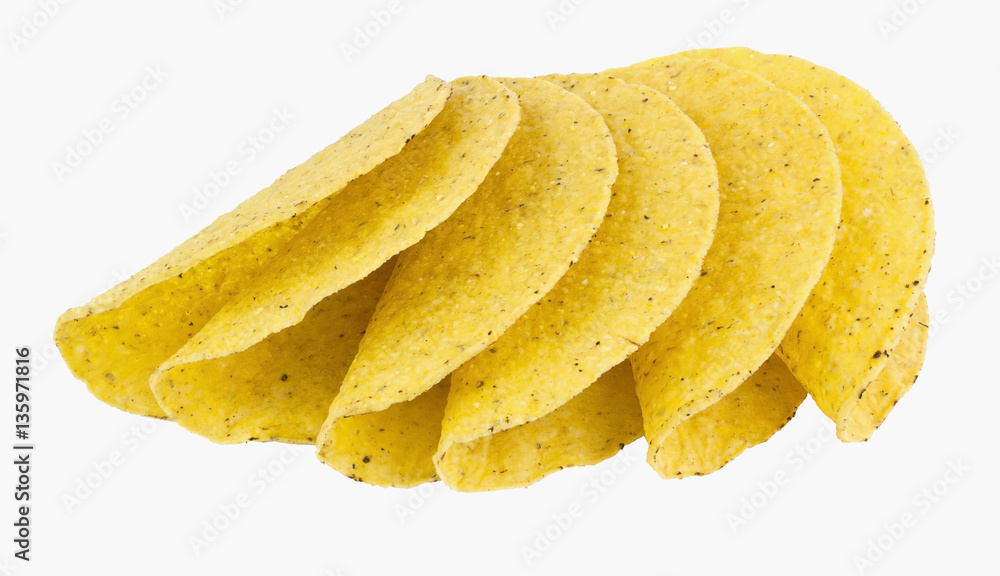 Cuddling, spooning yellow corn taco shells. Isolated. Cuddling, spooning yellow corn taco shells. Isolated.