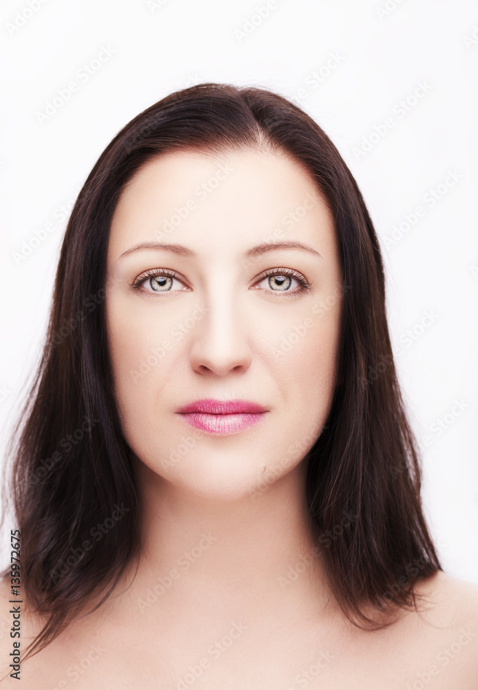 .Beautiful woman face close up studio on white background.
