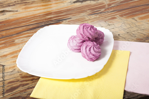 Wallpaper Mural  Beautiful composition of a pink zephyr on a wooden background Torontodigital.ca